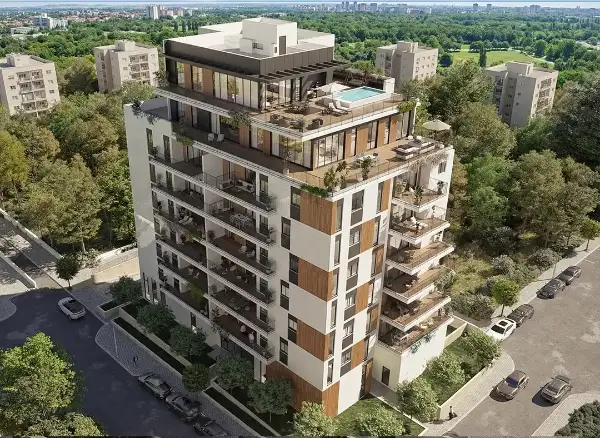 הדמיית מבט על של בניין הבוטיק בן 9 הקומות בסביבה ירוקה